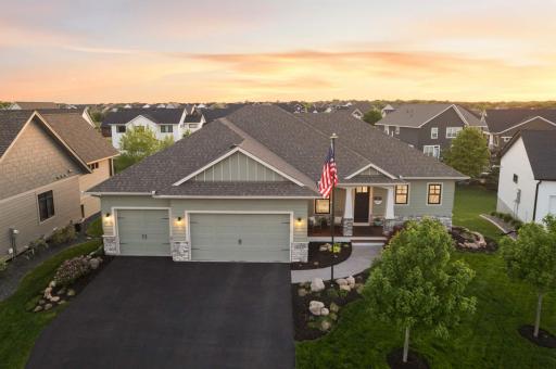 Welcome to 4152 Hummingbird Ct N, nestled in a cul-de-sac in the sought after Wildflower community master planed development!