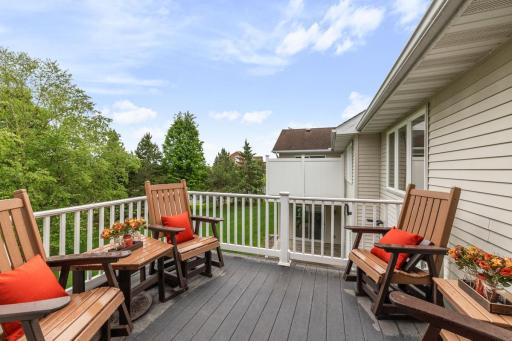 Inviting deck with woodsy views to the back