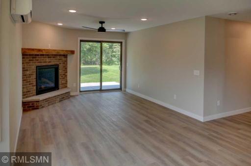 The patio door leads out to the concrete patio.