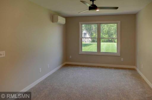 Large primary bedroom with its own mini split unit.