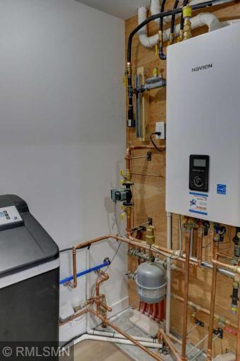 The boiler feeds both the domestic water and the in-floor heating. Very efficient!