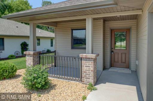 Inviting covered entry with maintenance free railing.