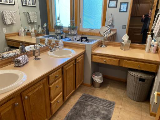 Main bath. 2 sinks and great space. Lots of mirrors. (Crack photographer is spotted!)