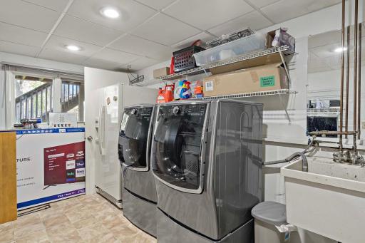 Great laundry room with plenty of storage