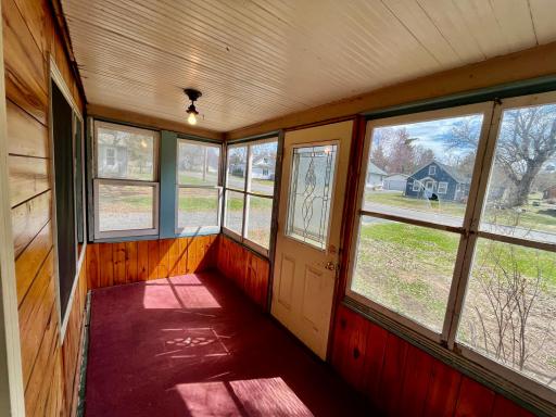 Porch leading to Living Room on front of home