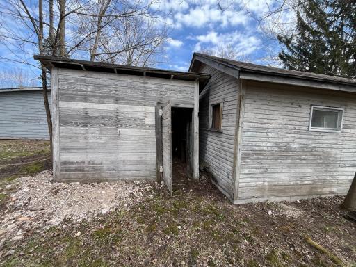 Small shed behind garage