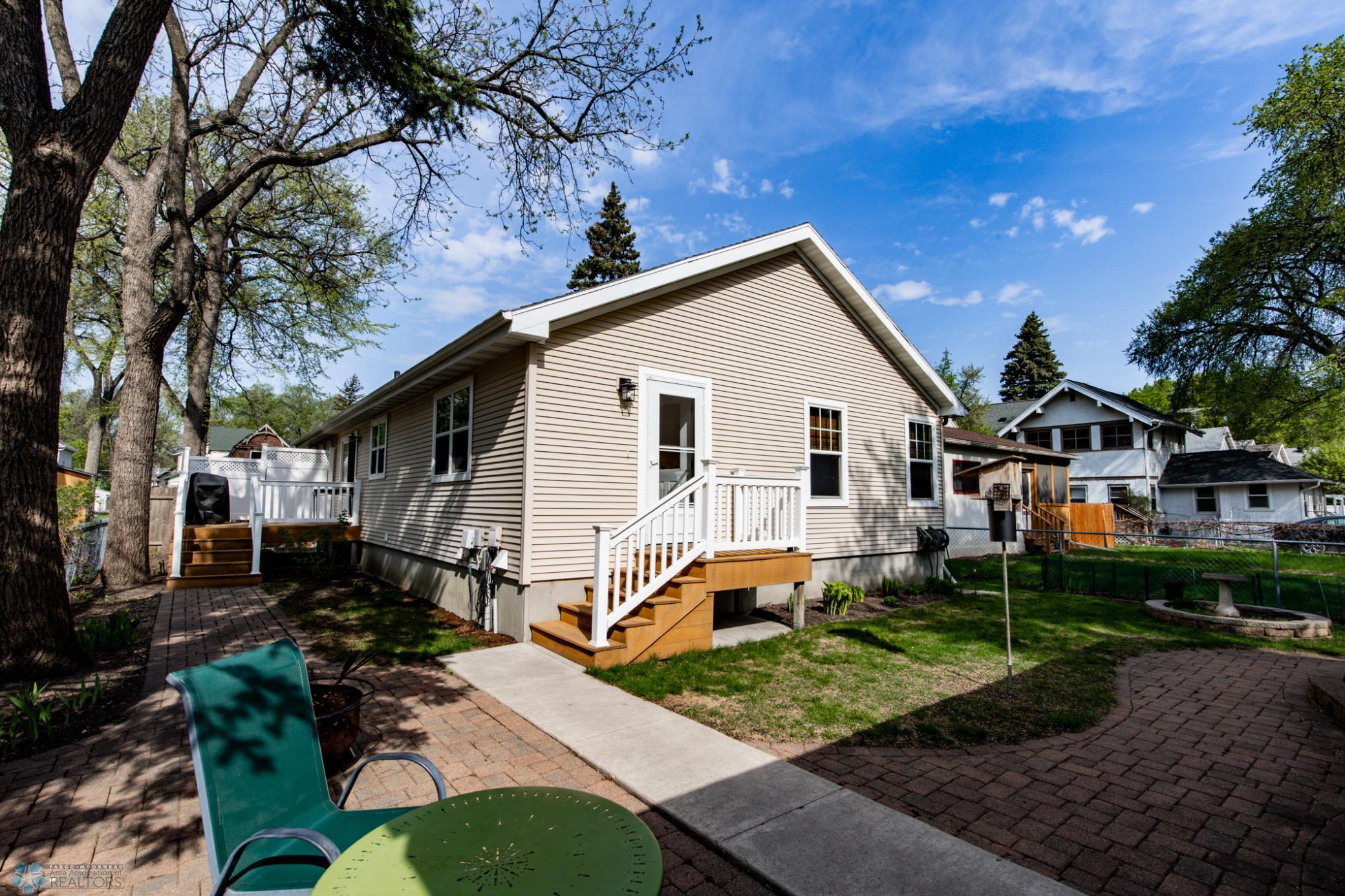 Rear Exterior + Backyard