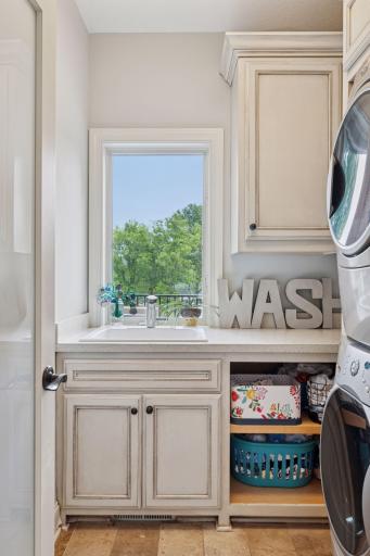 There is a second laundry on the main level. This is one of three laundry spaces within the home.
