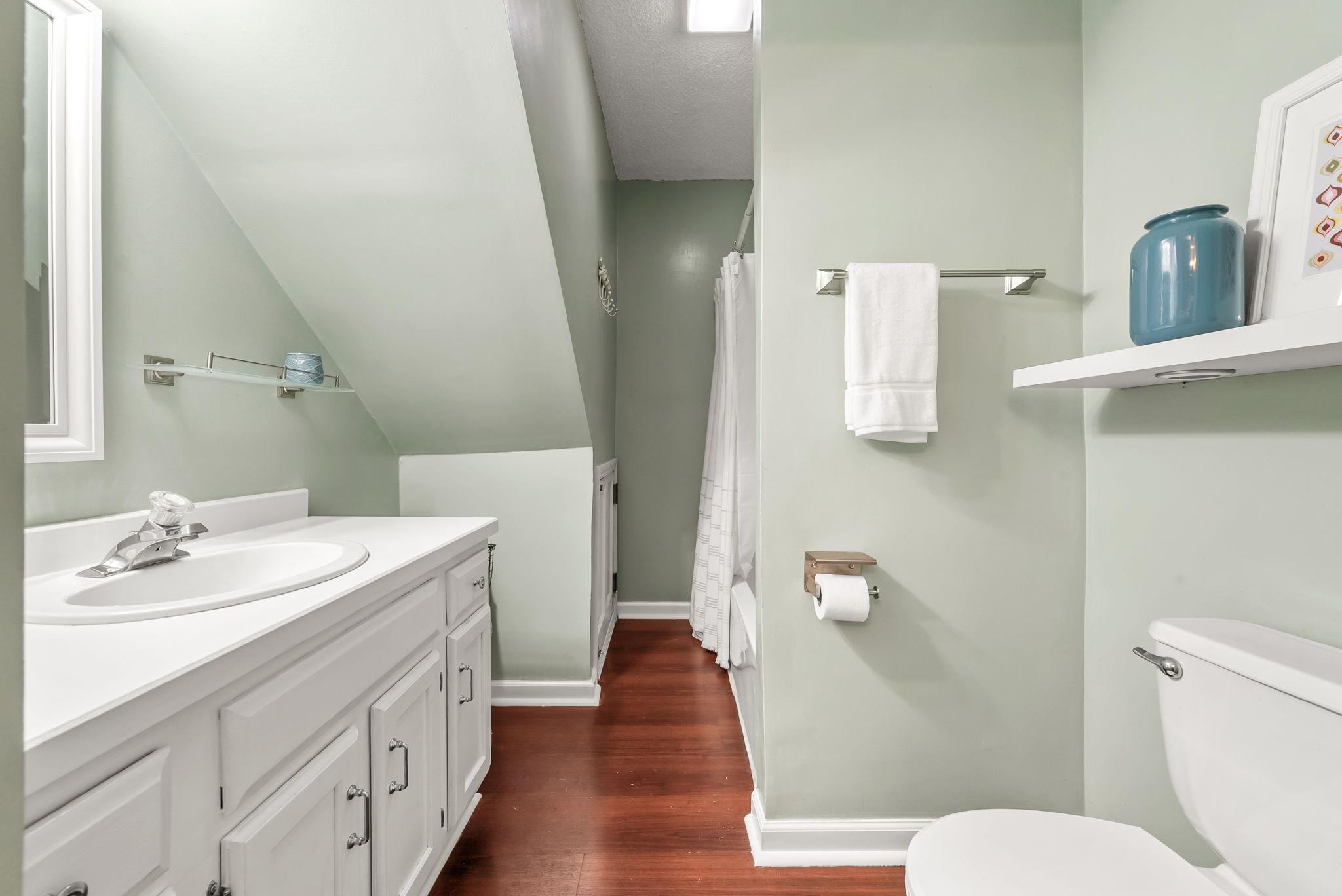 Off of the dining room is also a main level full bathroom.