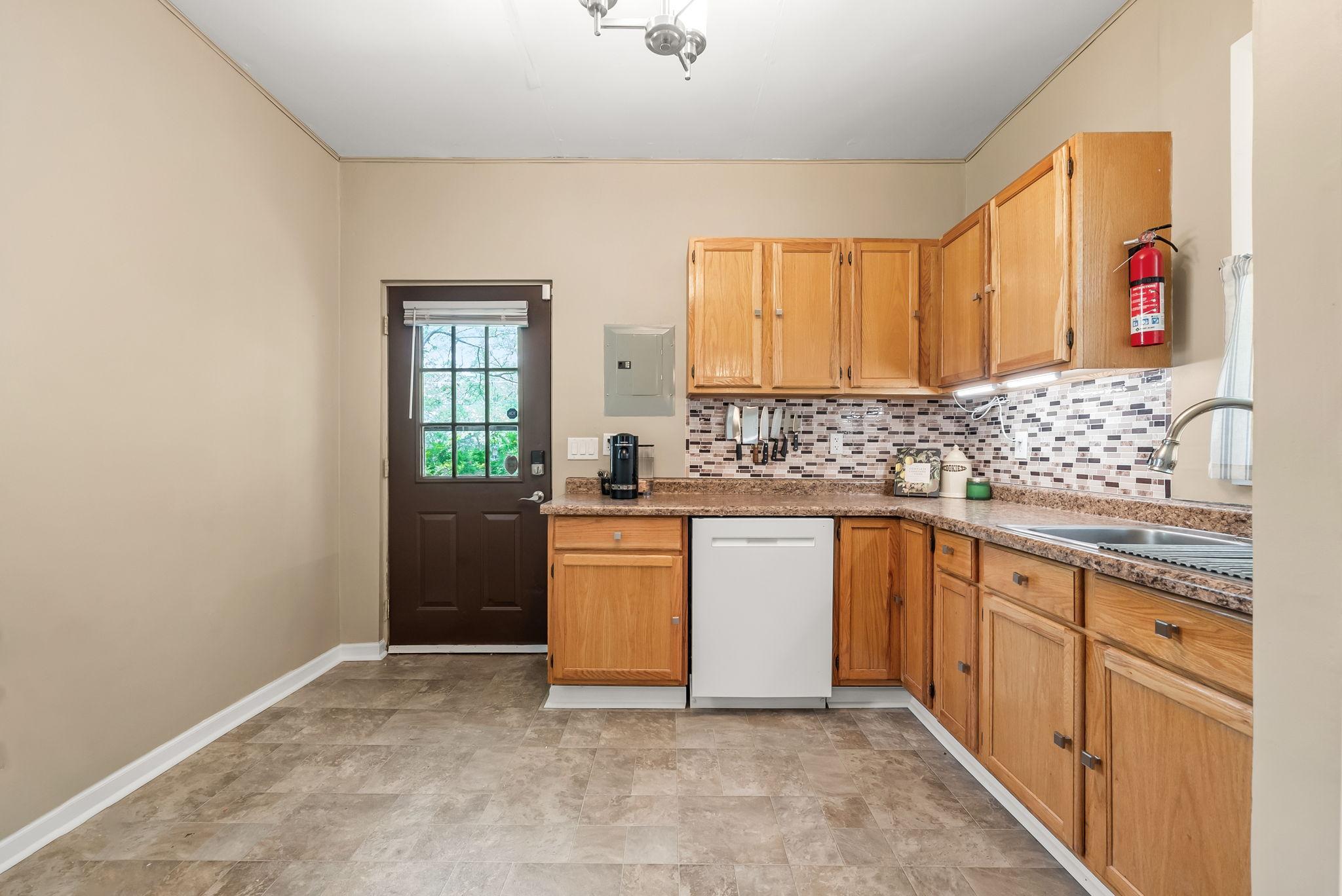 Through the dining room is the spacious kitchen.