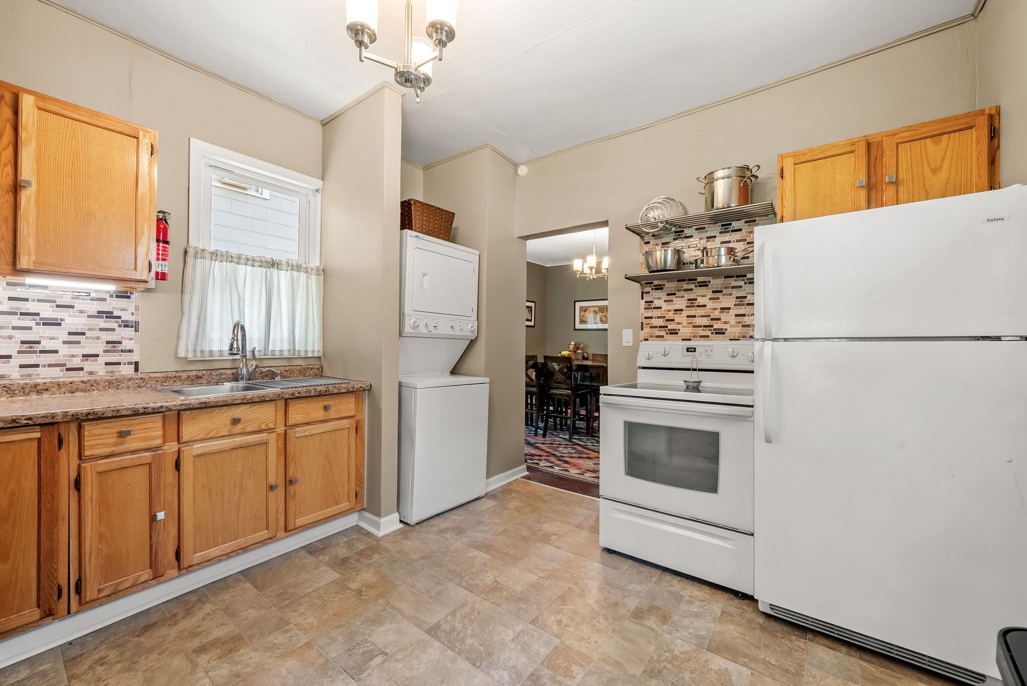 Alternate view of the kitchen with new flooring (2025)