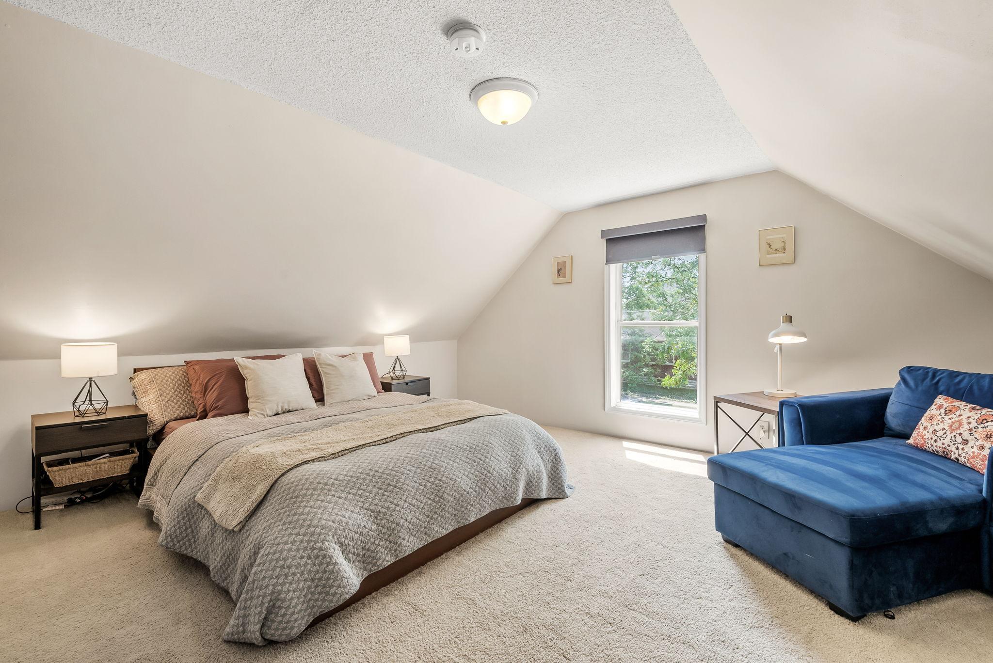 Upstairs you'll find the primary bedroom, additional half bathroom, and additional flex room.