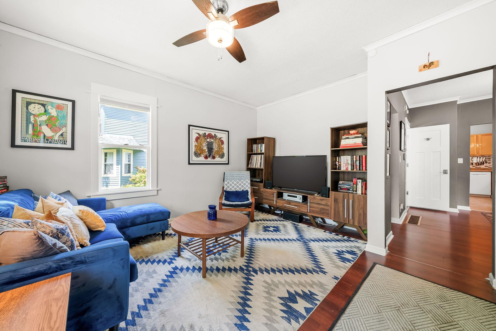 Step inside to the living room with south and east facing windows for an abundance of natural light.