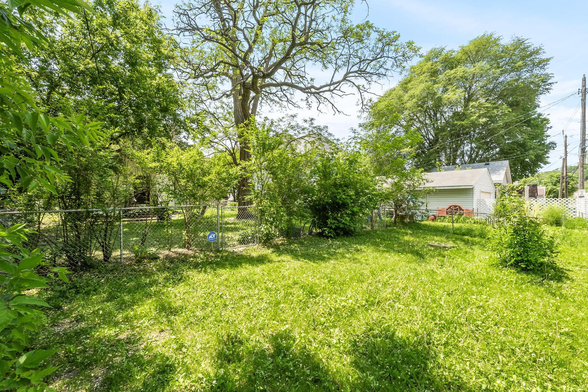 The yard is currently fenced-in and has more than enough space to add a garage or carport.