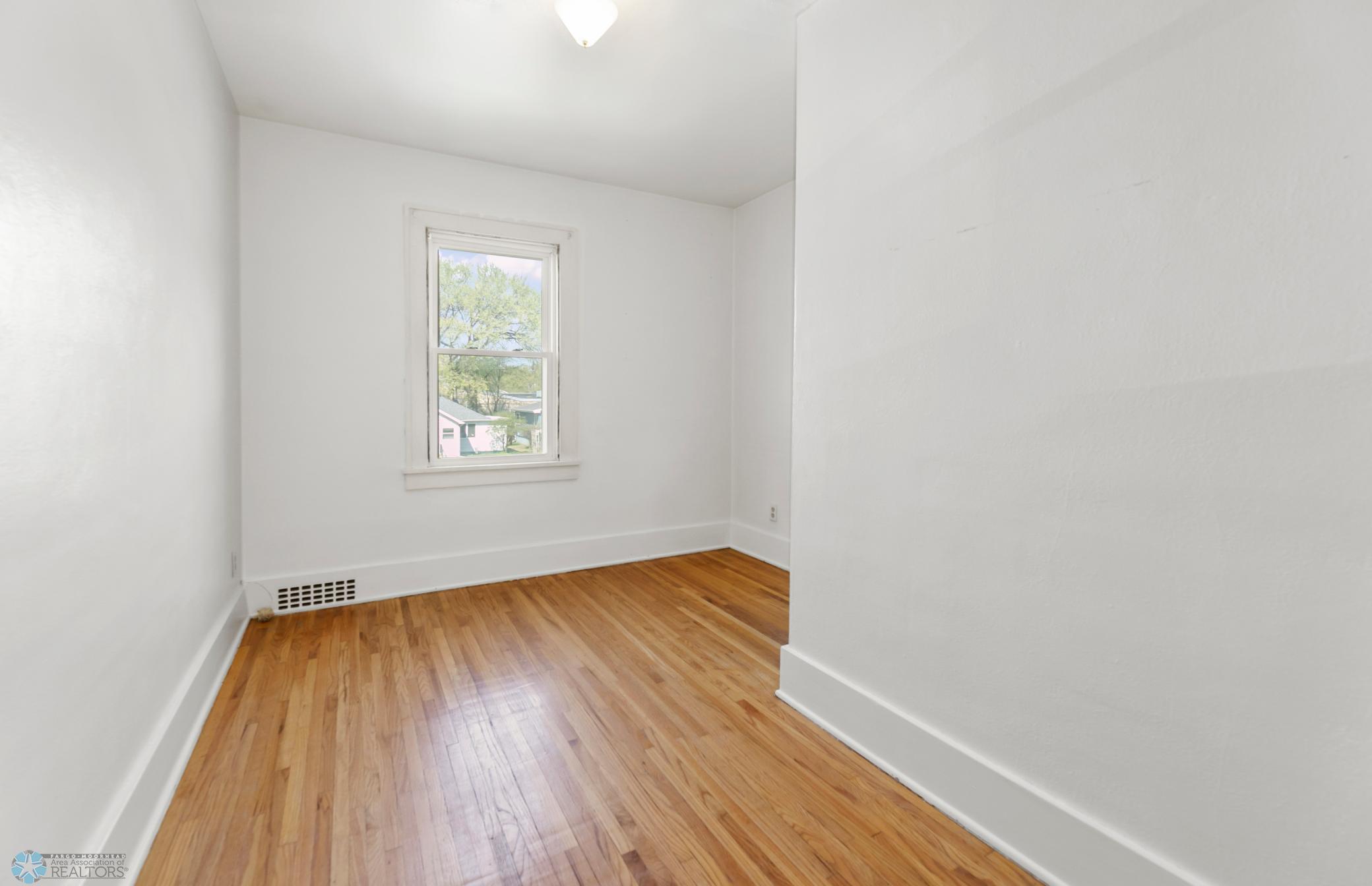Bedroom 1-view 1 hardwood floors
