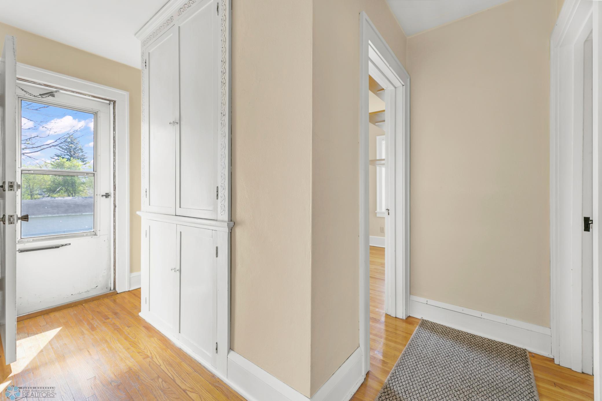 Hallway-built in storage/mini upper deck