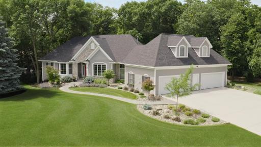 270 Turnberry Court, Hudson, WI 54016, on a 1+acre corner wooded lot. The landscape was recently refreshed, and a cement 4-car wide driveway was added.