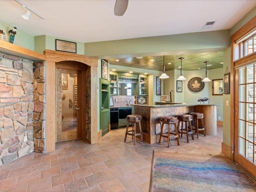 Lower Level Lakeside Bar, Wine Cellar and walkout to large lakeside patio