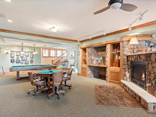 Lower Level Rec Room with 2 sided custom gas fireplace