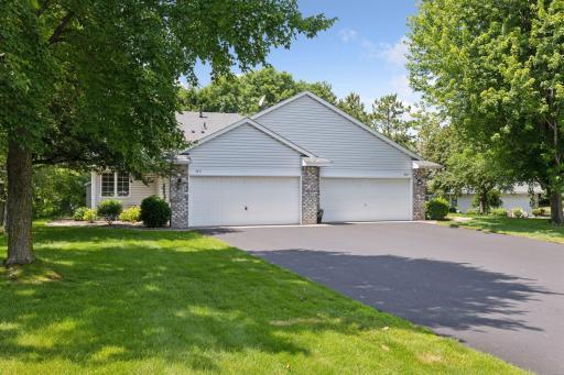 Spacious end unit overlooking pond/wetland area.
