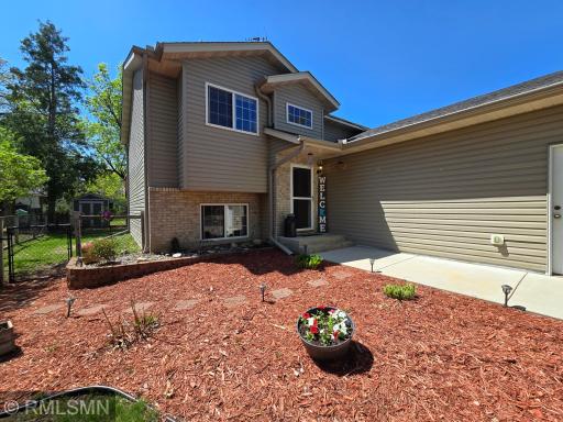 The incredible color of the fresh mulch and beautiful flowers jump out and warmly welcome you.
