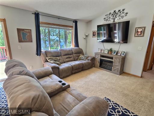 The main living room offers the right amount of comfort and light for all to unwind and convene.