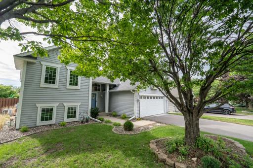 The home has landscaping around the perimeter. It would be a very easy to add your favorite plants and perennials. Notice some mature trees which will give you shade throughout the summer.