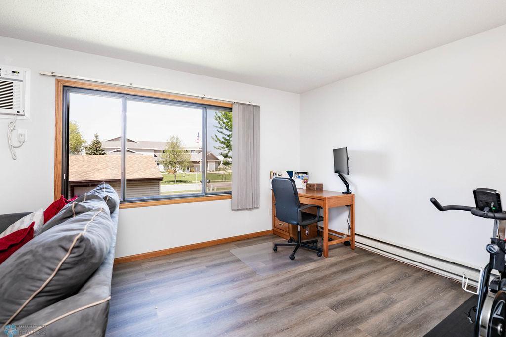 Spacious living room offers space for office or make it a playroom area!