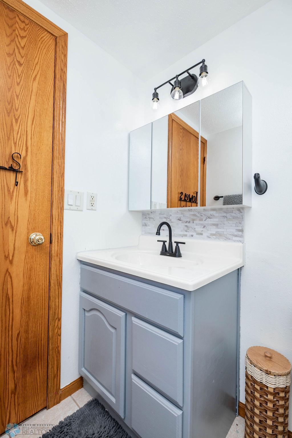 Full Bath with large medicine cabinet mirror