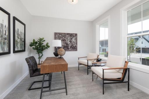 French doors lead to a bright main floor office, which comes in very handy today when we bring our work home with us.