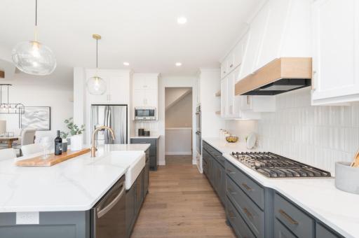 You will enjoy preparing a meal and entertaining in this kitchen! Plenty of room for multiple chefs!