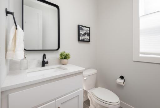 A very handy, bright and clean main floor half bath.