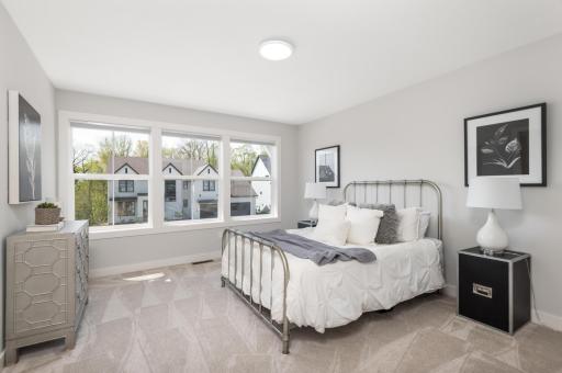 Bedroom 2. Upstairs you will discover 4 bedrooms, 3 baths, laundry room and bonus room.