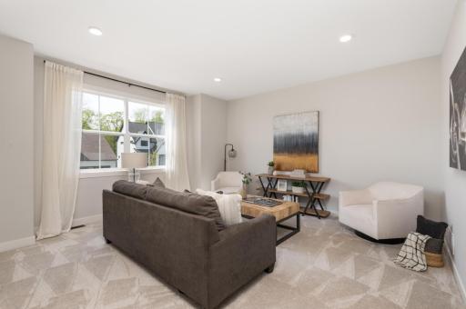 The bonus room is perfect for homework, studying and relaxing. Recessed lighting helps with reading and homework.