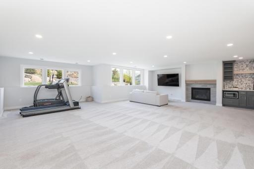 There is plenty of room for your largest sectional and big screen plus tons of recessed lights. The gas fireplace is nice during the cooler months.