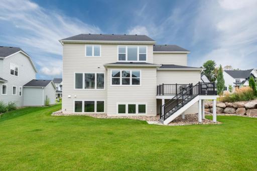 The home has clean lines and looks great from the front and back. The steps from the deck are handy to access the level back yard.