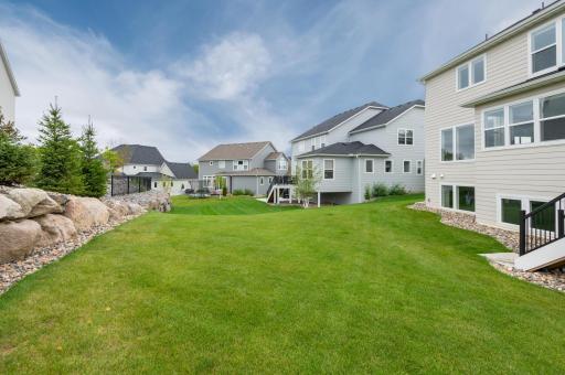 Nice plush lawn to play ball or games! There is a sprinkler system and a manual drip system in the landscaping.