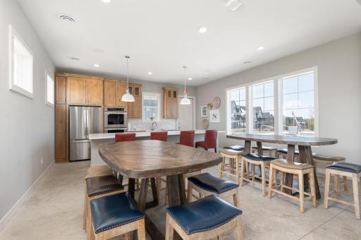 A full kitchen with bar and plenty of seating for 20 or more.