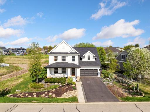 Welcome to 343 Primrose Path – charming white exterior with a brand-new roof (2024)!