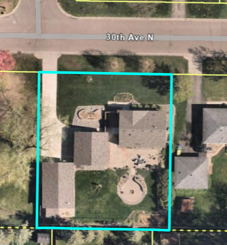 Sky view of the larger lot showing the house the 2 car garage and the 4+car Mancave and larger back yard