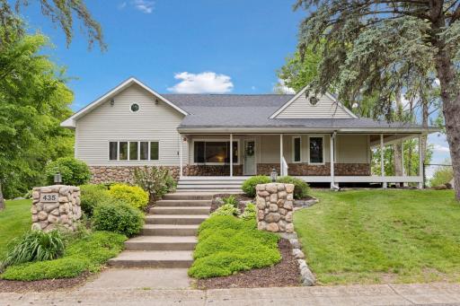Front of the home with a large wrap around front porch
