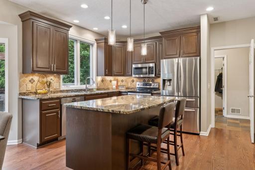 Breakfast/snack bar is where good conversations are had~
Mudroom and walk-in closet off the garage entrance (on the right)