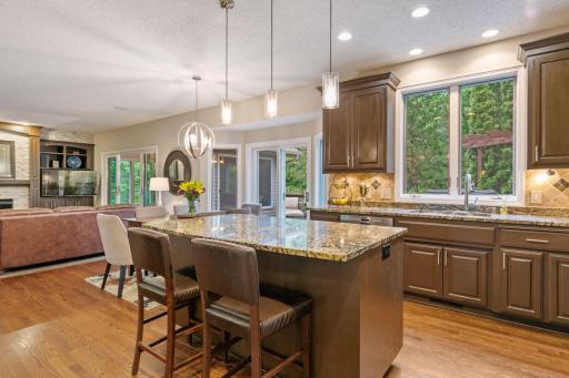 Tasteful remodel with warm rich earthy tones and classy lighting elements~