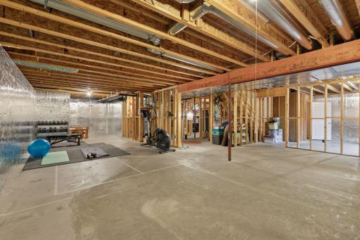 Unfinished basement. Framed and plumbed for your finishes. Egress window in place if BR #5 is desired.