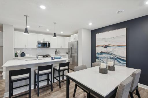 The dinette and kitchen easily offers seating for 8 - perfect for you and your family friends to enjoy a evening of food and fun!