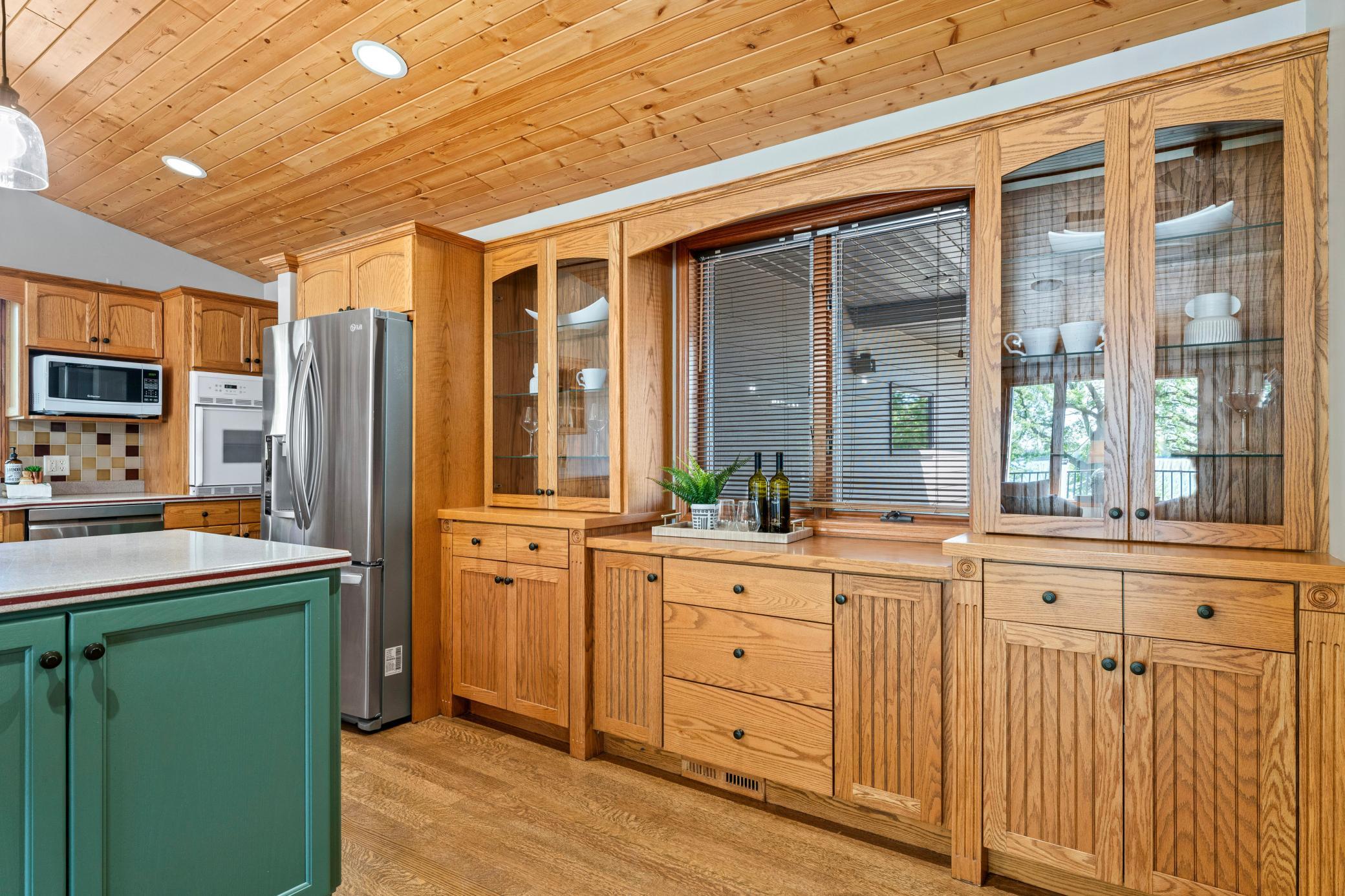 Gorgeous Custom Built-ins look out onto the Front Yard