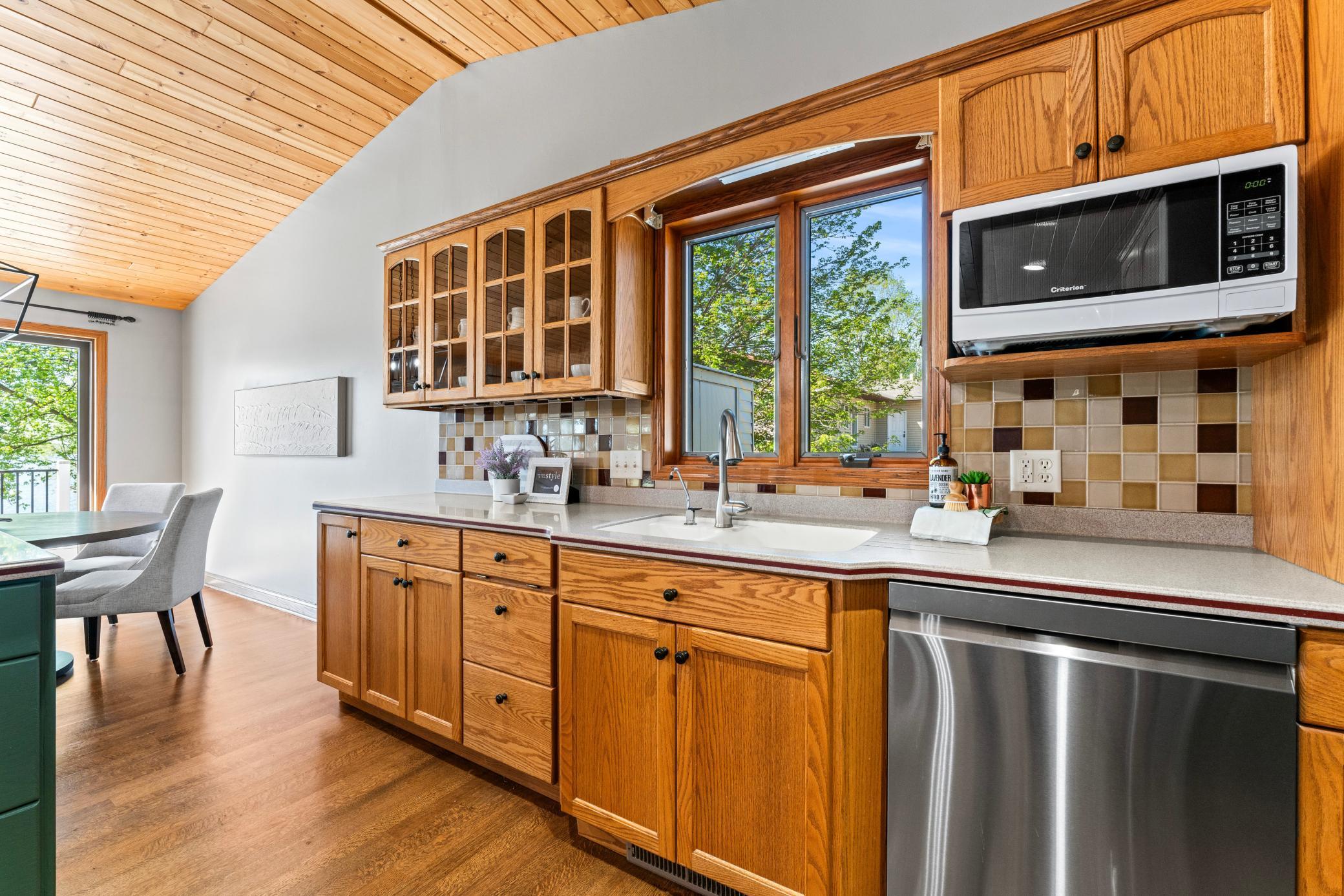 Custom Cabinetry with Glass in Upper Cabinets.