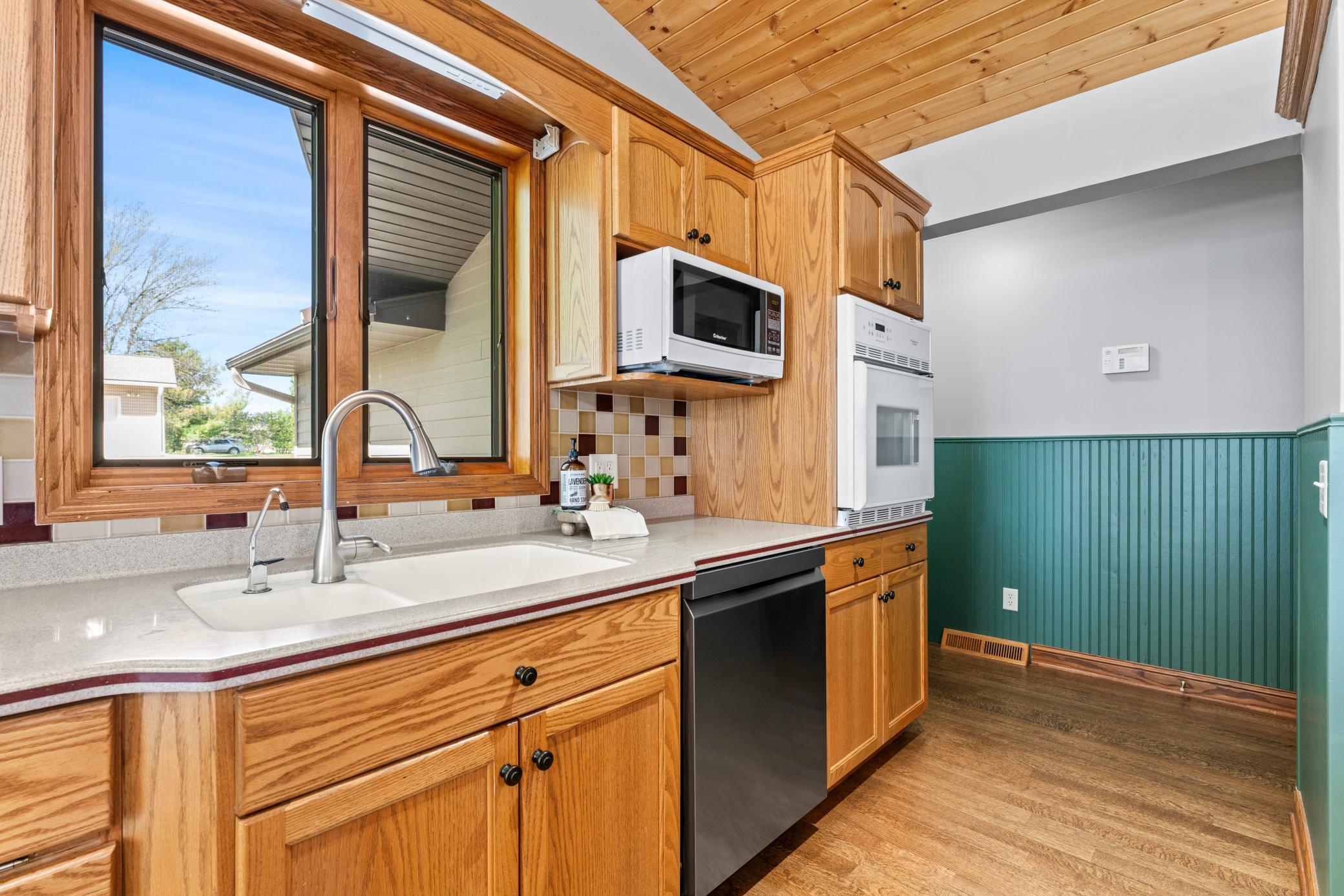 Corian Solid Surface Countertops and Window Over the Sink