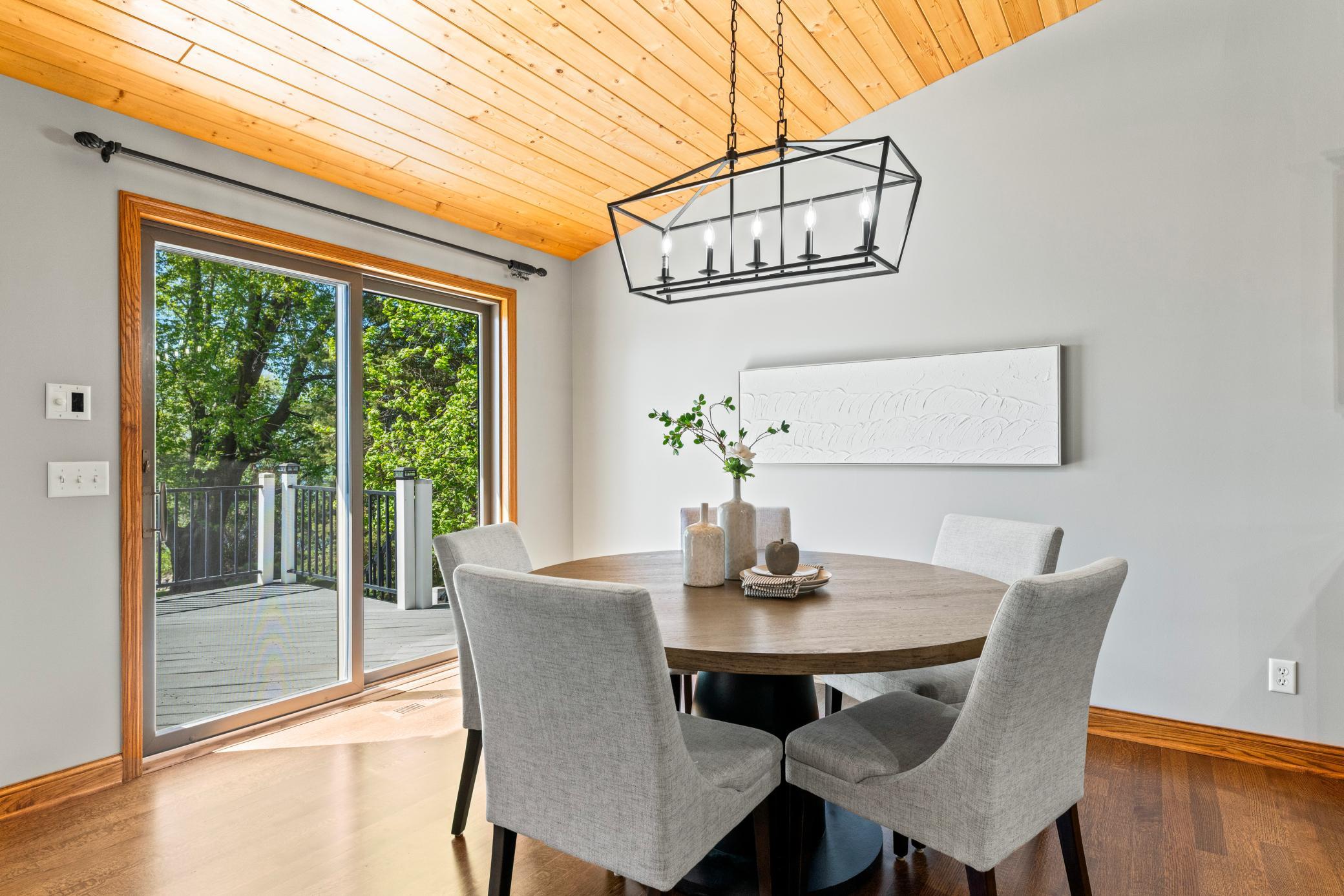 Informal Dining Opens to Large Deck off The Back