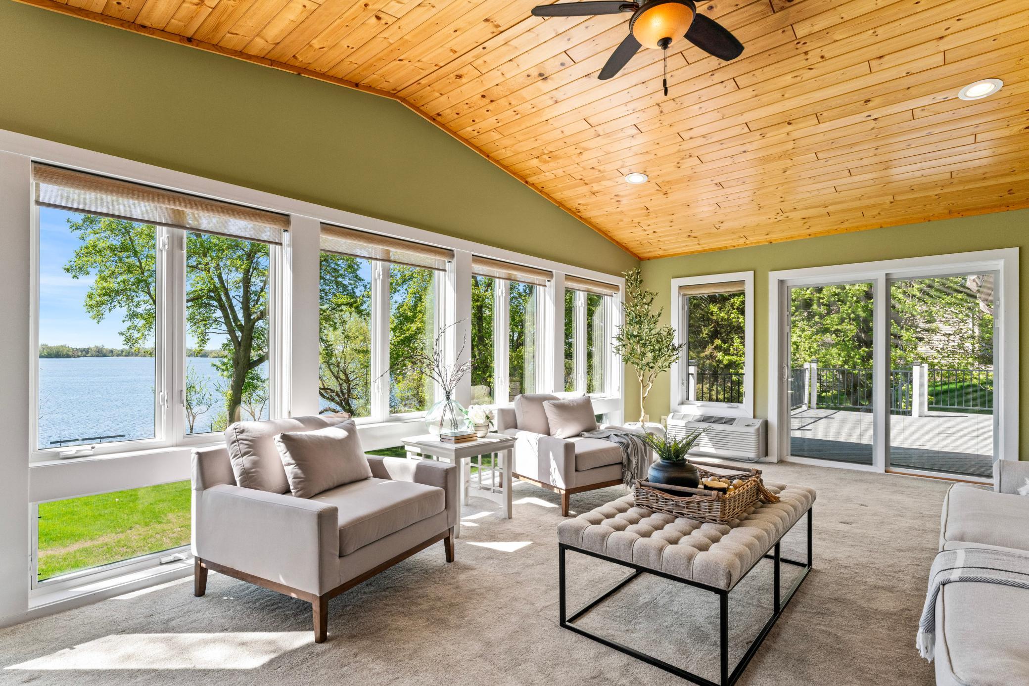 Look at All These Gorgeous Windows. Custom Roll-up Shades and Mini Blinds Between the Panes of the Patio Door in the Sunroom